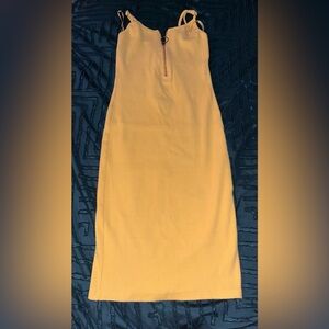 Yellow bodycon mini dress with zipper detail